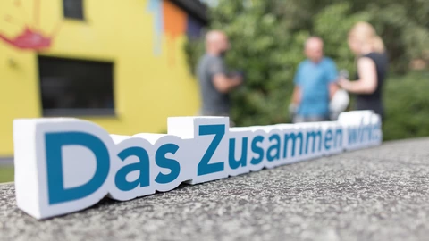 Bild des Slogans "Das Zusammen wirkt"