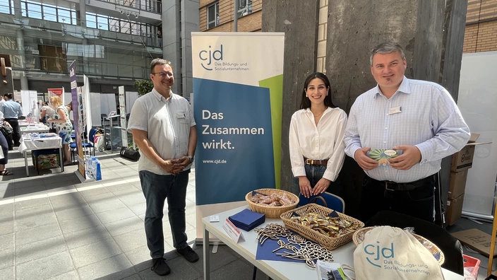 Die drei CJD-Mitarbeitenden auf der Bildungsträgermesse in Saarbrücken