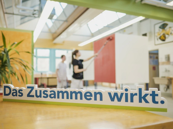 Auszubildende in einer Malerwerkstatt des CJD